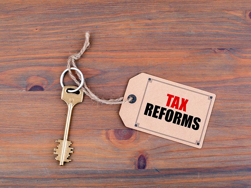 key with tax reform tag